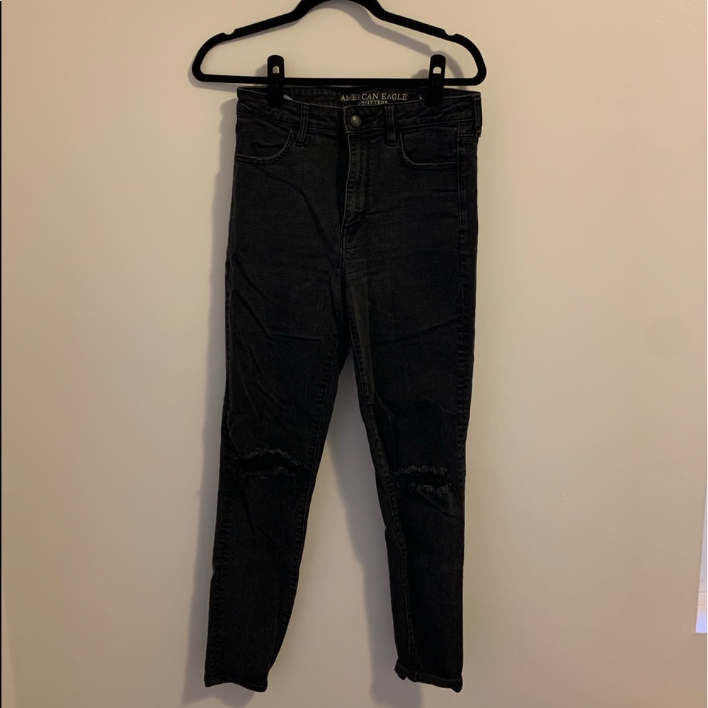 black american eagle jeans with knee holes.